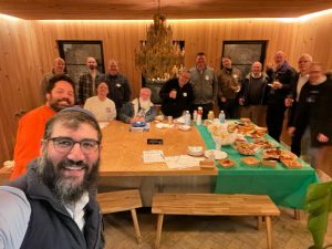 Rabbi Mordy Rudolph takes a selfies with Dads at Trace Brewing.